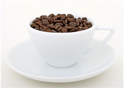 Picture Of Natural Coffee Beans And White Cup